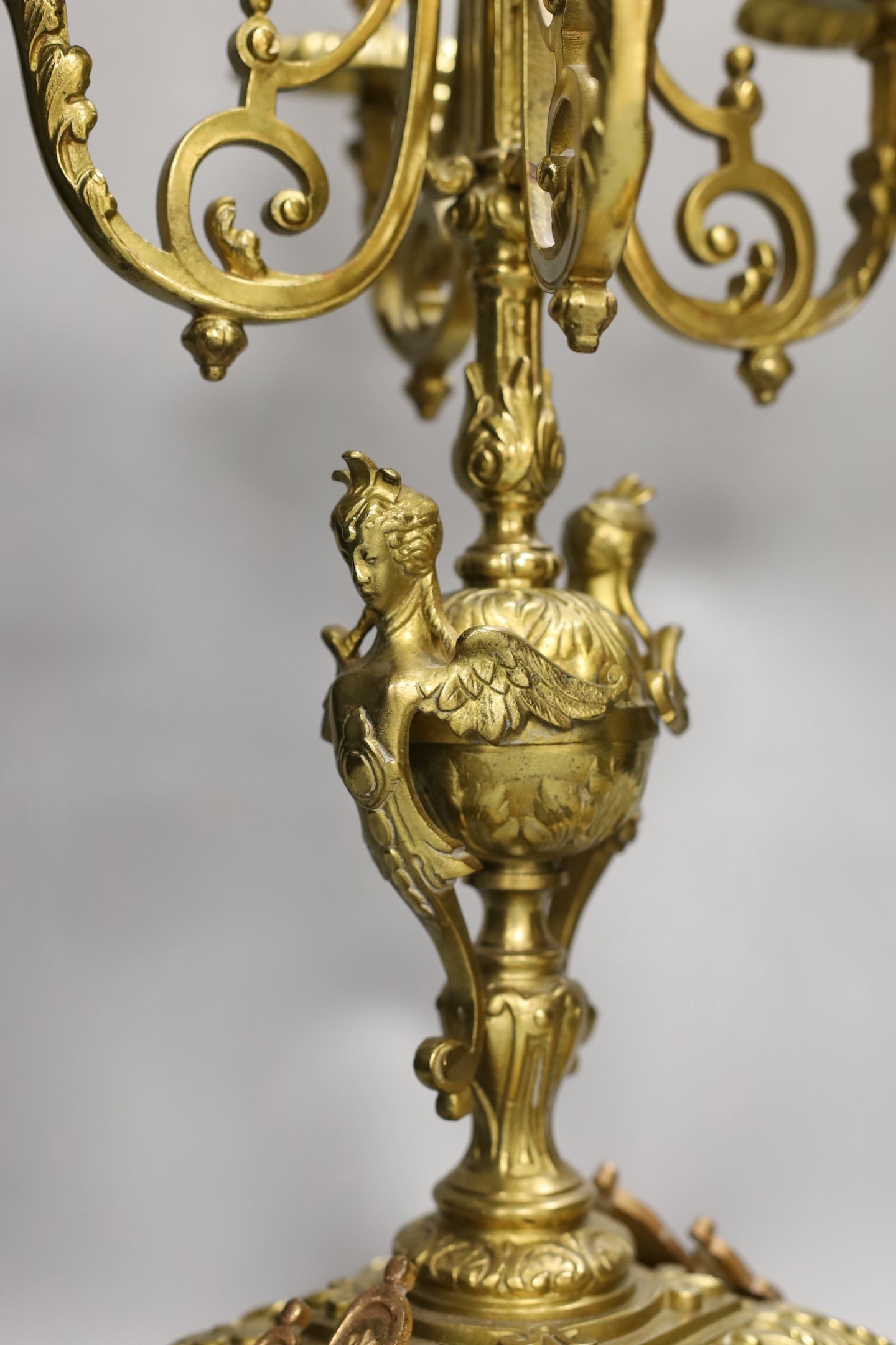 A pair of ormolu five light candelabra,49cms high